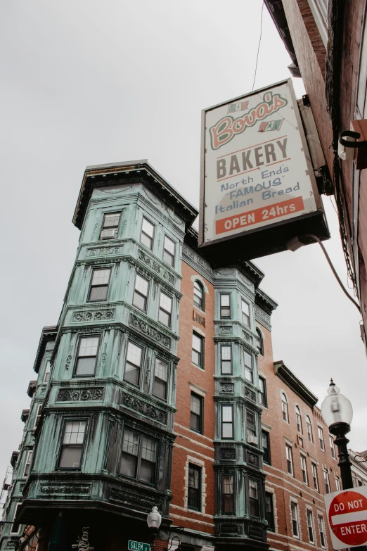 several buildings and signs on the outside of them