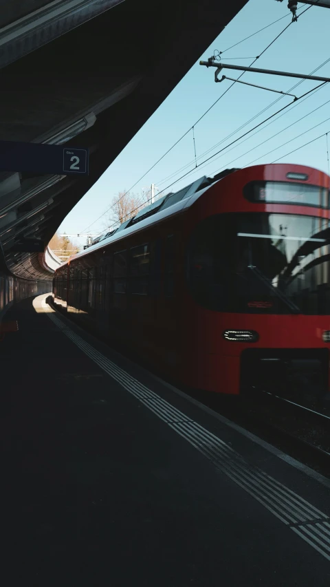 a large long train on a steel track