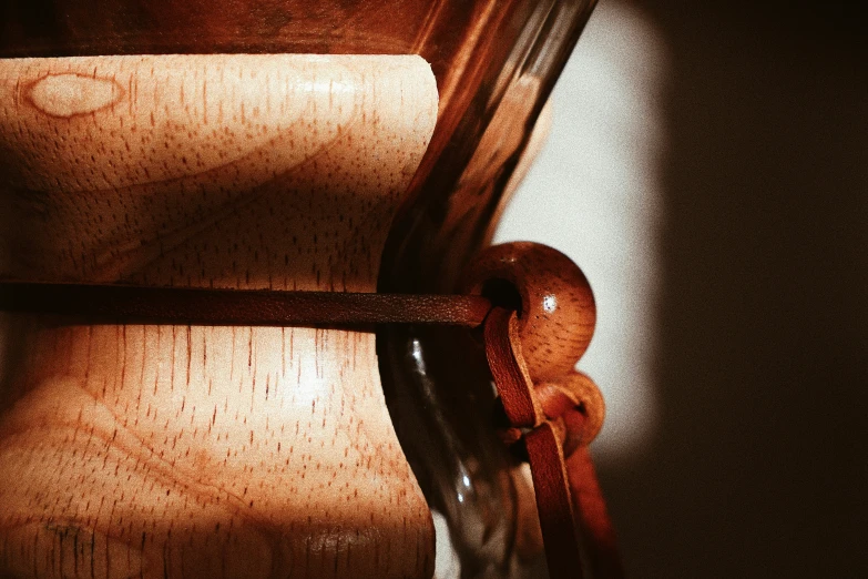 a wooden chair is pictured, on the table