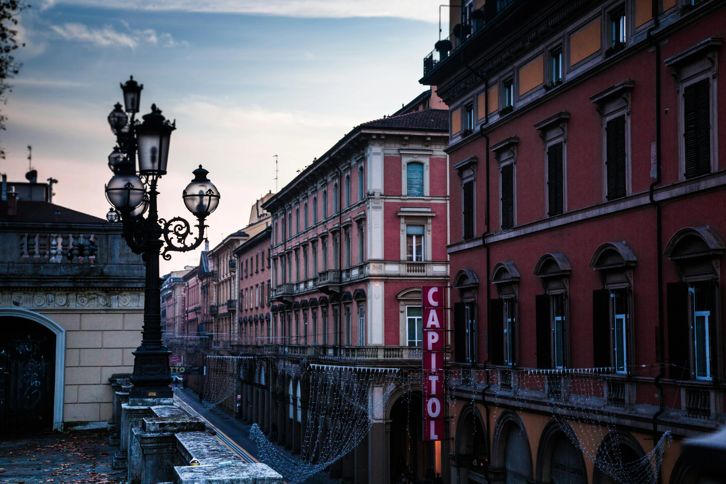 red and white building, street light and gated courtyard