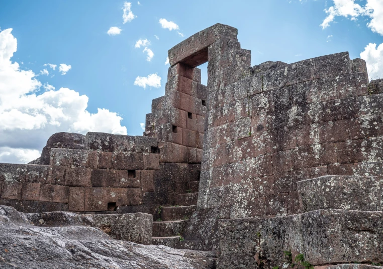 an image of a stone building on the land