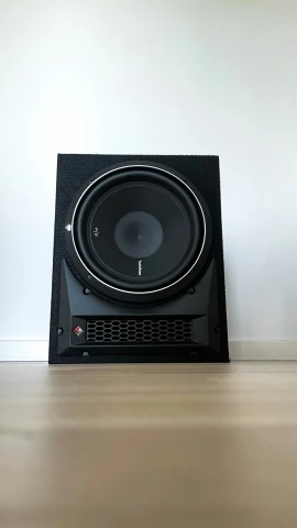 a computer that is on top of a stereo