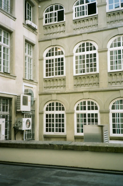 an old building with a street light in front