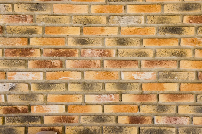 a picture of an old, worn - down brick wall