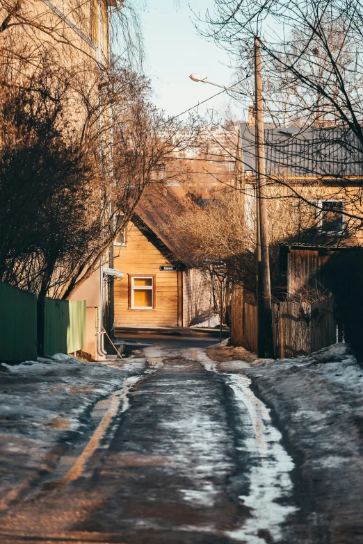 a view of an empty neighborhood on a sunny day