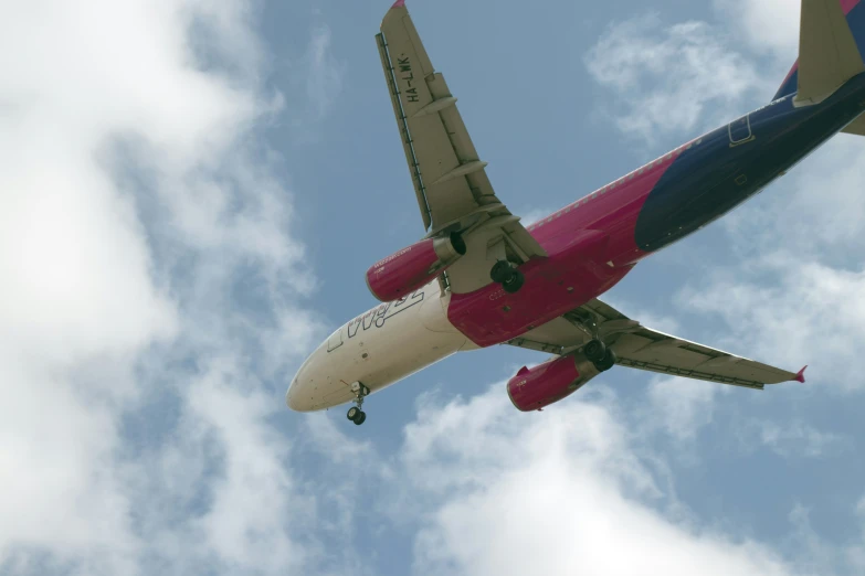 a large air plane flying through the sky