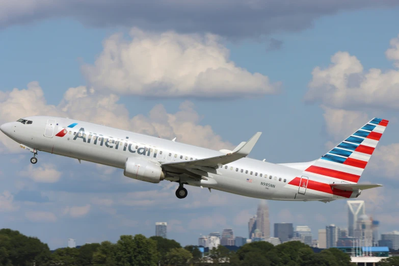 an american airlines plane taking off from an airport