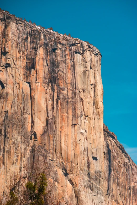 a large, jagged mountain rises from the ground