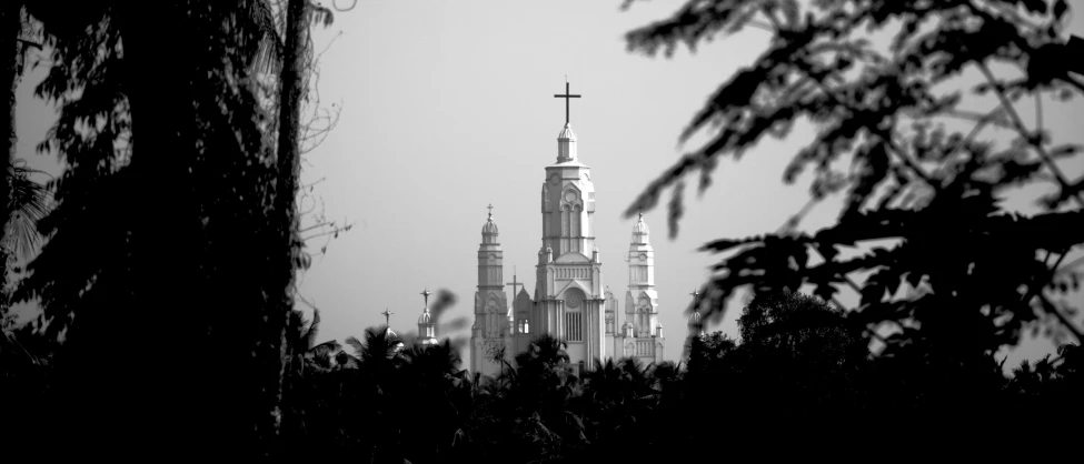 this po shows an old church tower and clock tower