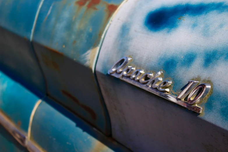 the nameplate on the front of a classic car
