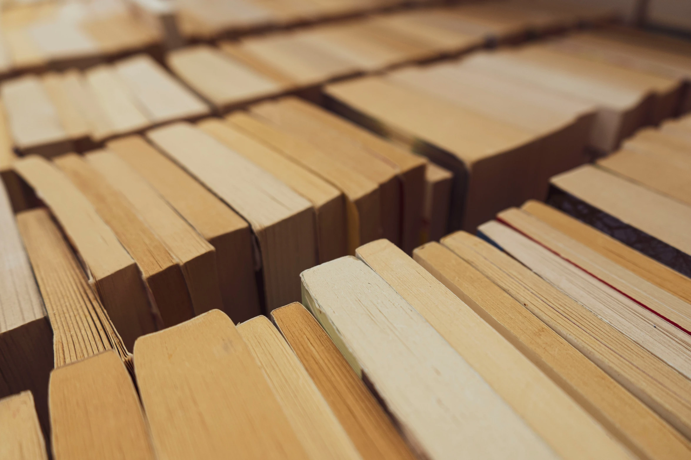 wooden planks piled up in a room