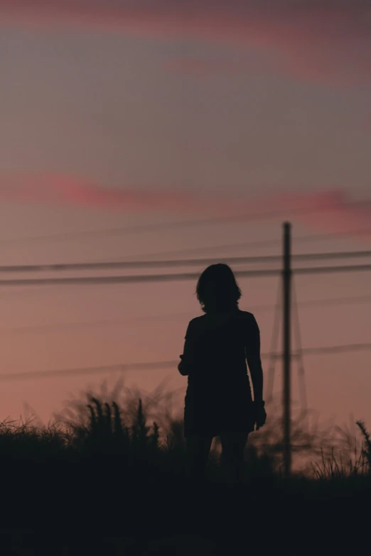 a person looking at the sky and clouds