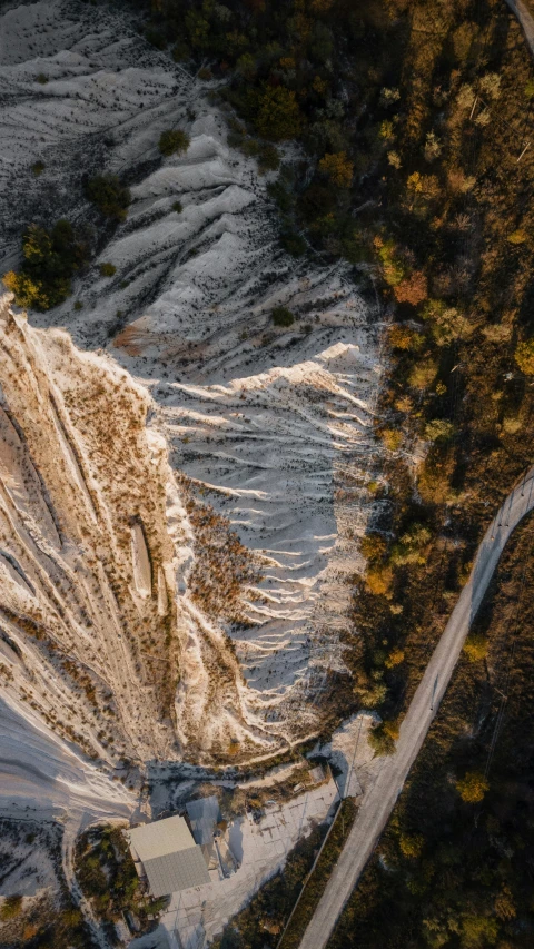 the view from above looking at a winding road