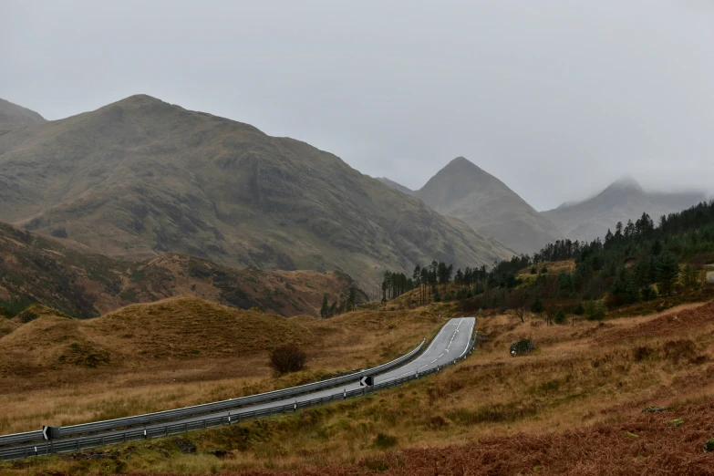 the curve in the road is a mountain range