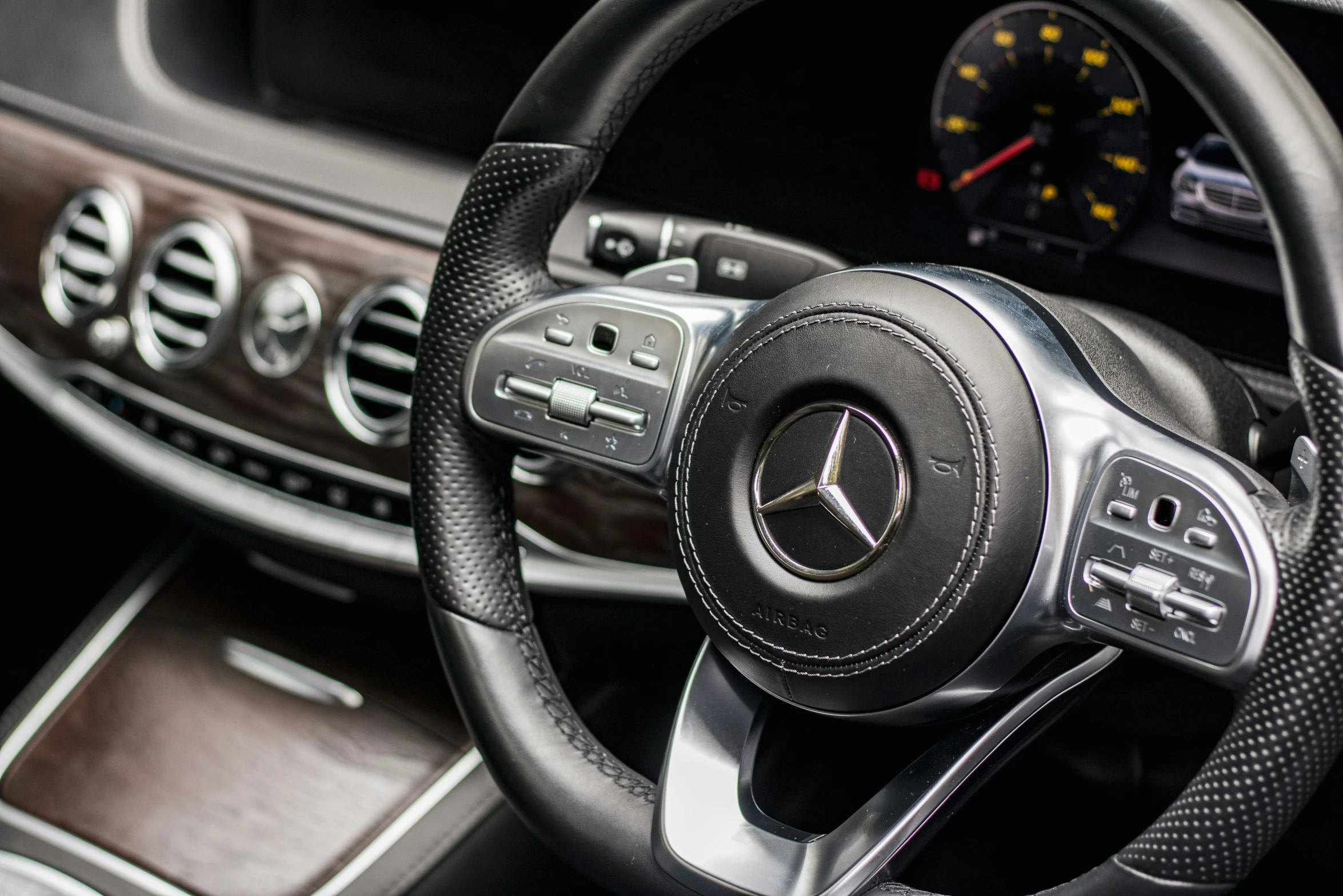 the dashboard and display of a mercedes car