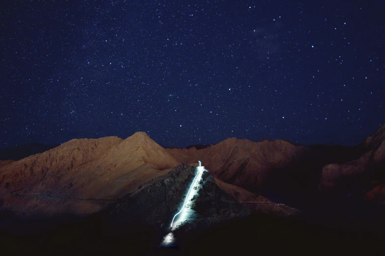 an image of a road under a night sky