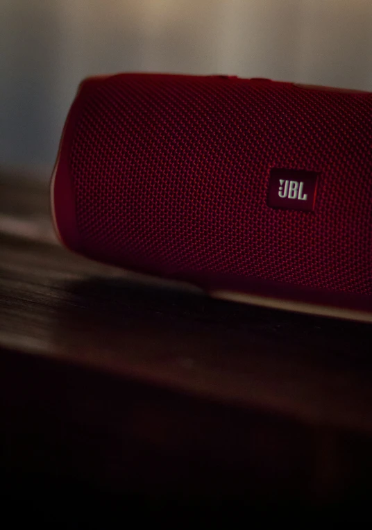 an jbl portable speaker sitting on top of a table