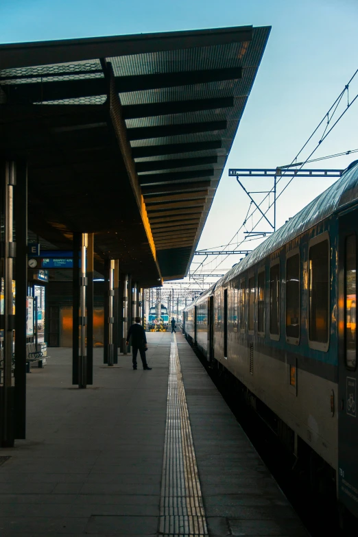 a train parked at a train station next to the platform