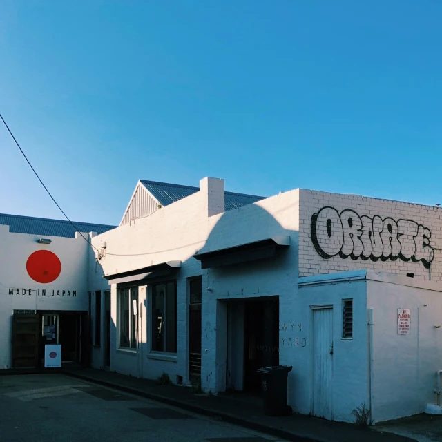 this is an old style white building on the corner