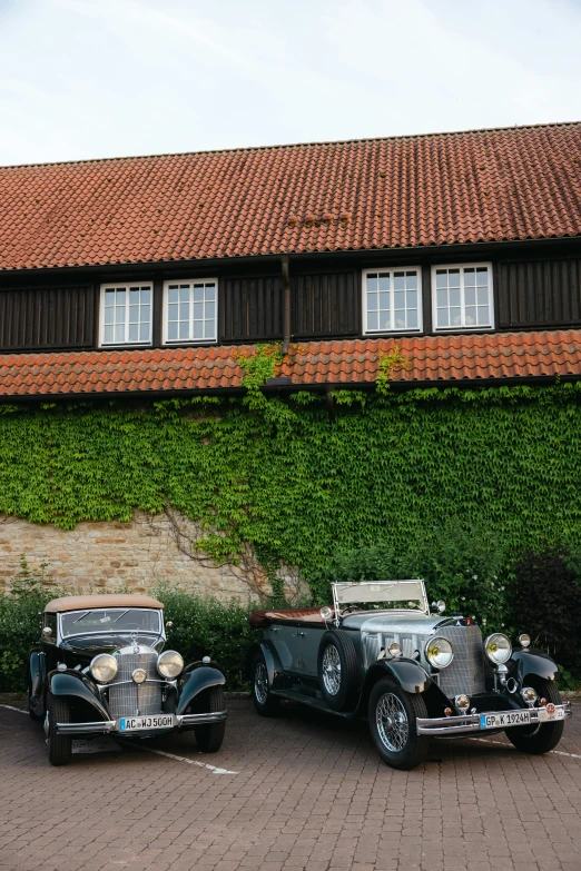 two cars parked beside each other on a street