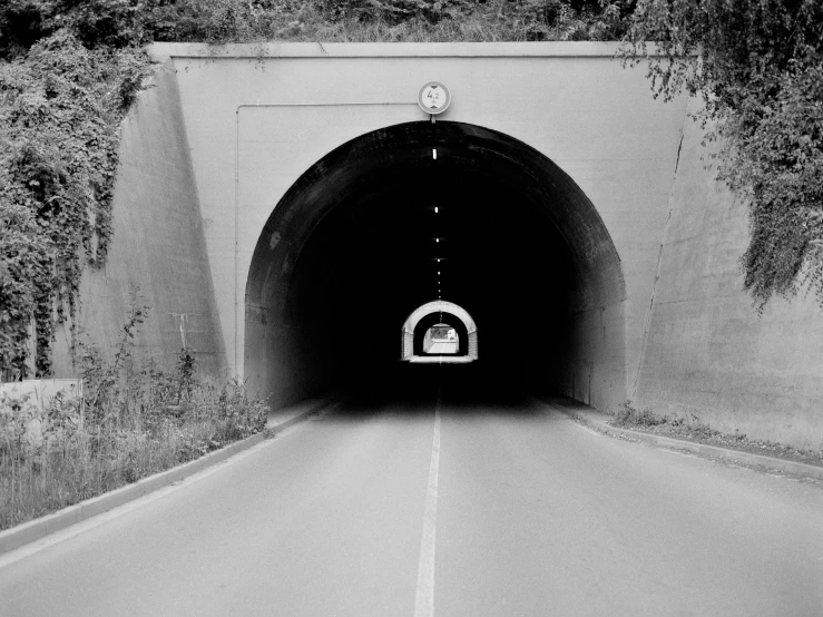 black and white pograph of a tunnel entrance