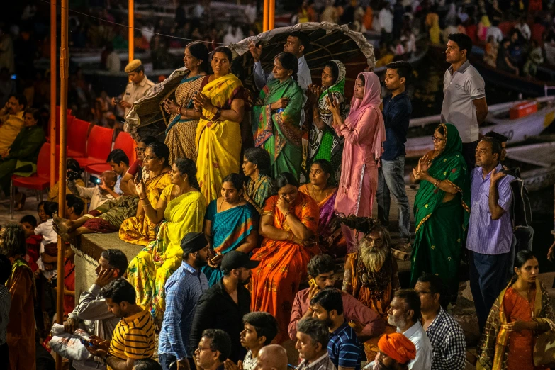 a crowd of people that are standing together