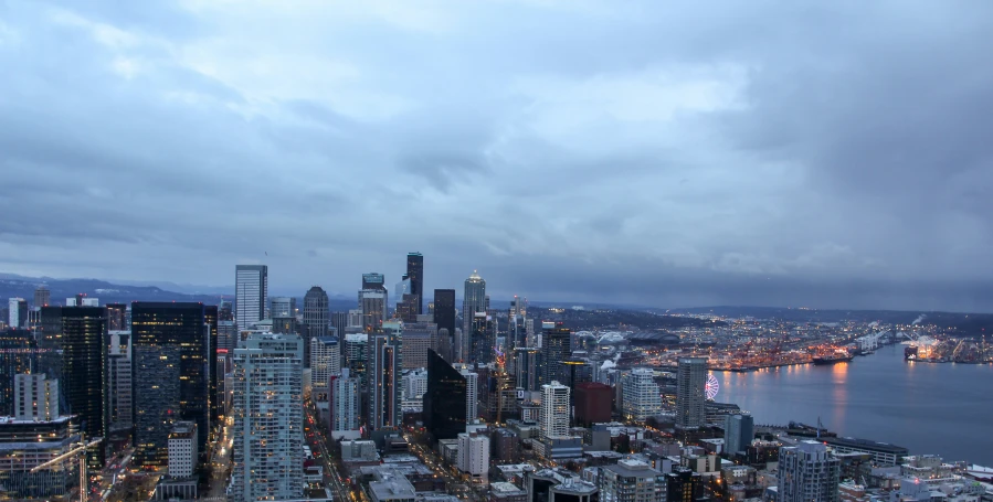 an image of a city with a cloudy sky