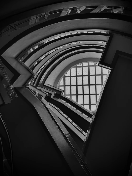 the inside view of a building with multiple glass windows