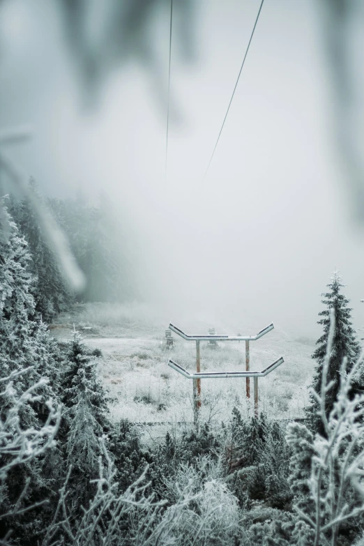 an empty ski slope on a foggy day