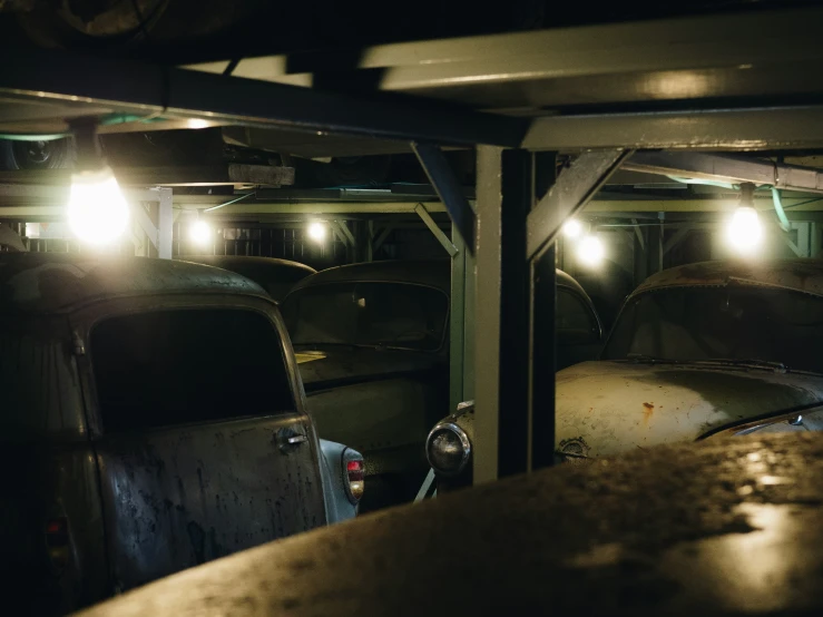 an empty storage room with many cars parked