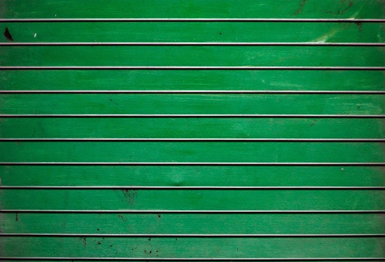 an image of a bright green wall texture background