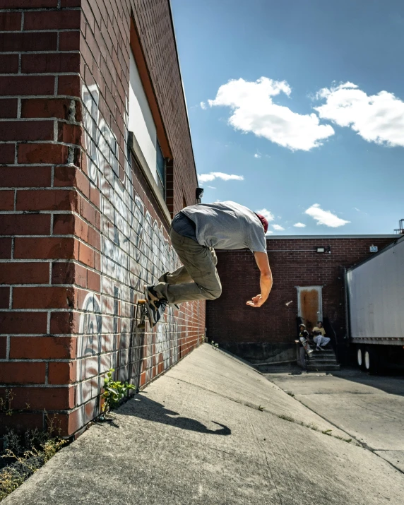 a person jumping up into the air while on a skateboard