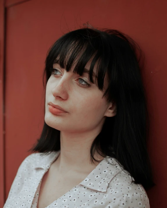 a close up of a person with long black hair