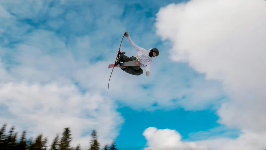 the skier in midair performs a jump