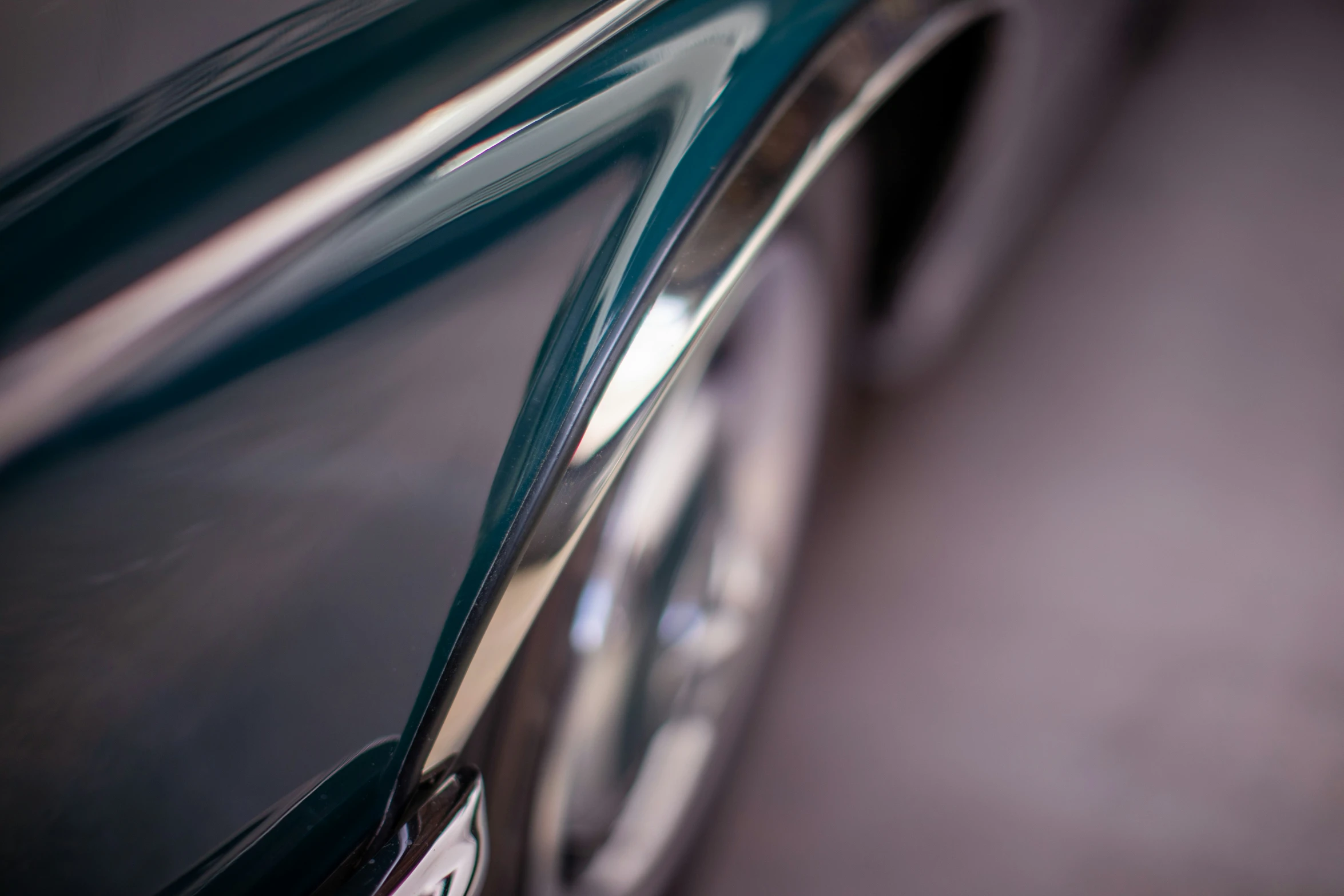 a car is shown in close up as it sits parked