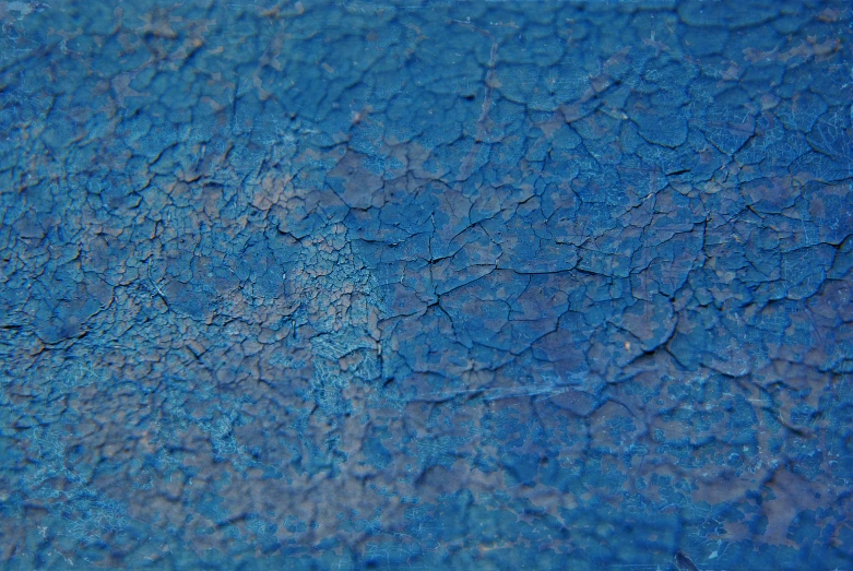 a blue and grey texture background with only some color to it