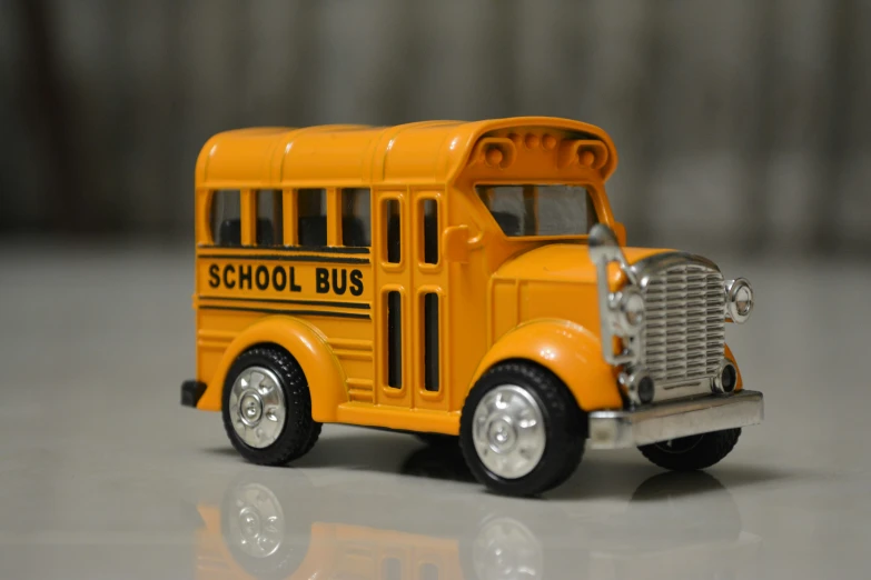 toy bus on display in room during event