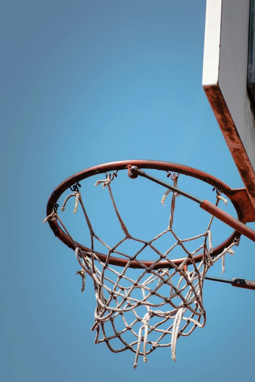 a view of a basketball hoop with an eagle above