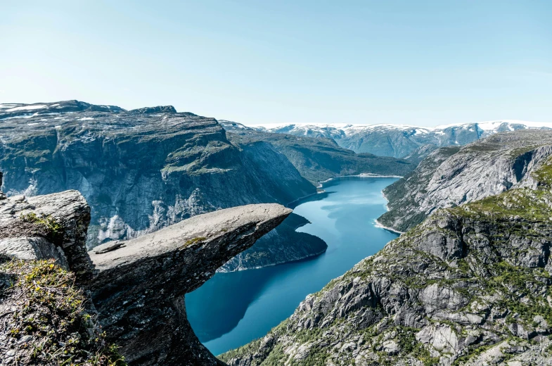 an aerial view of the ocean and mountains of norway