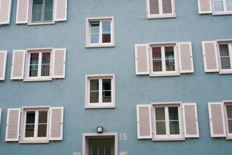 many windows and shutters of an old building