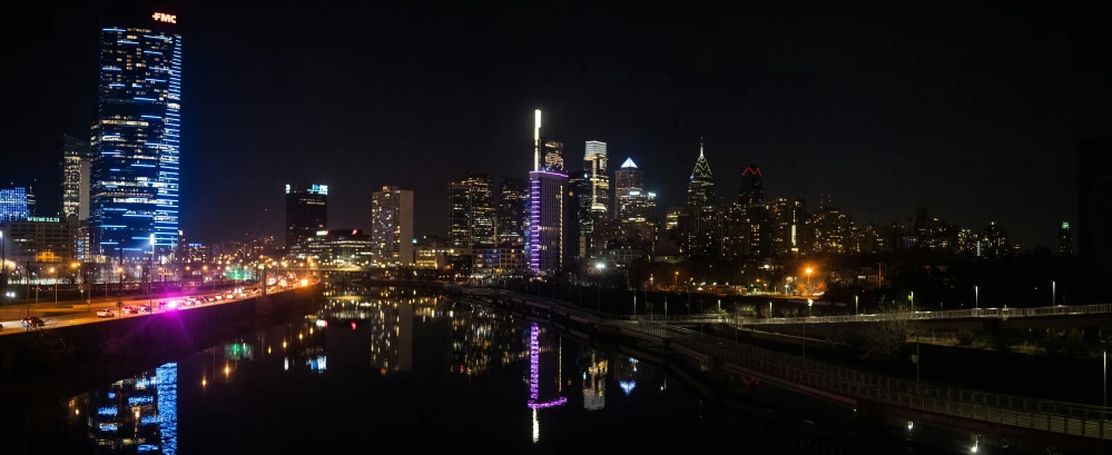 a view of the city and lights at night