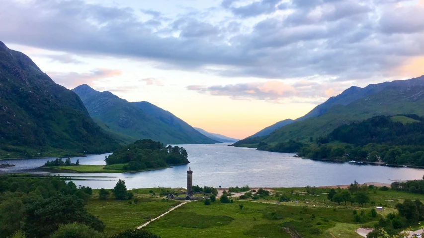 the mountains near a body of water on the land