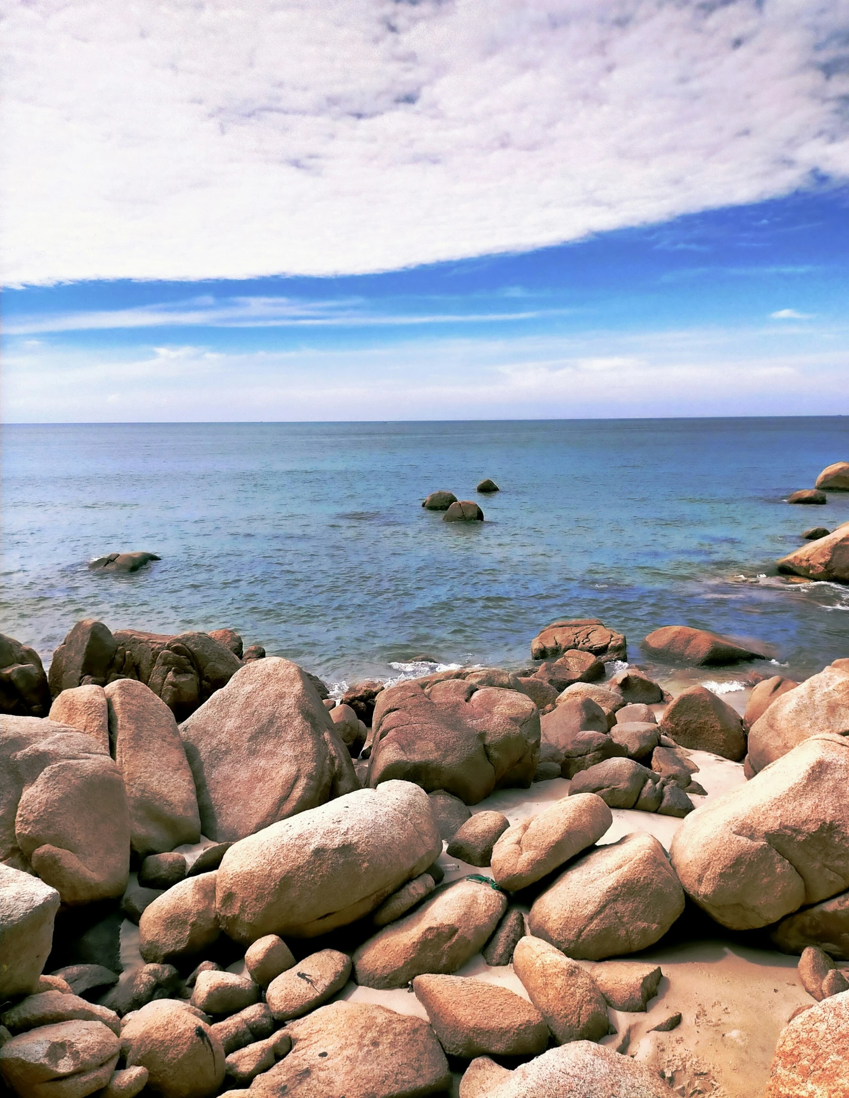 rocks on the beach at the ocean shore