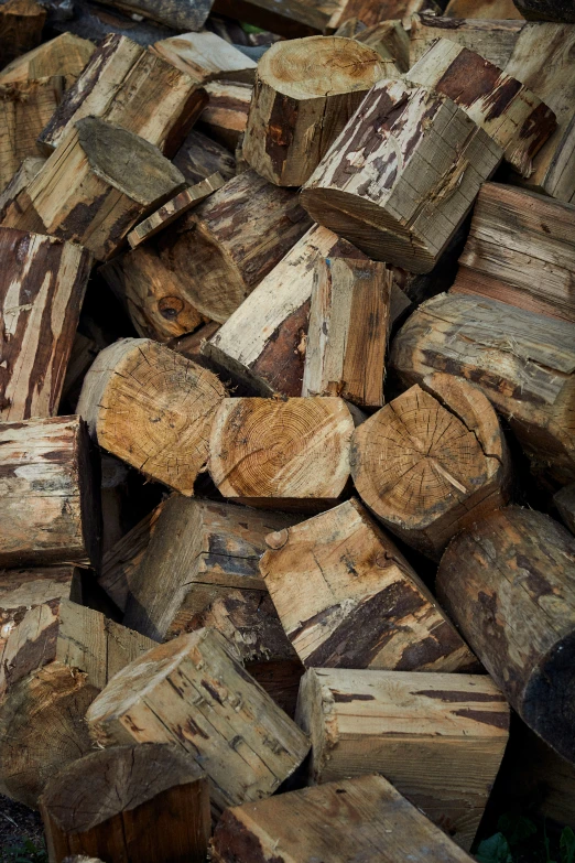 several wood pieces stacked together in a pile