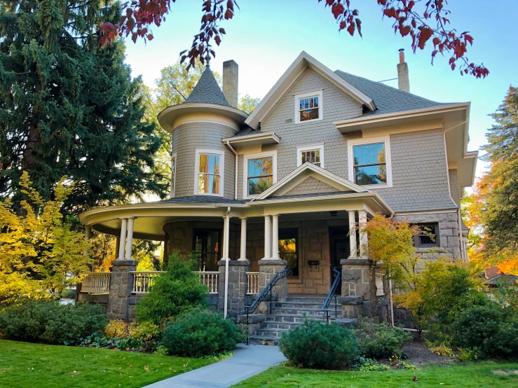 an older home is in the middle of fall