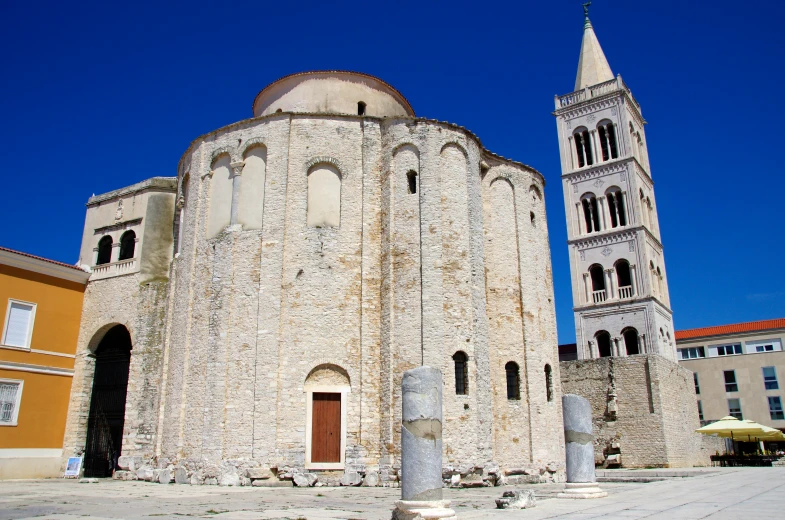 a large church that has two steeples on it