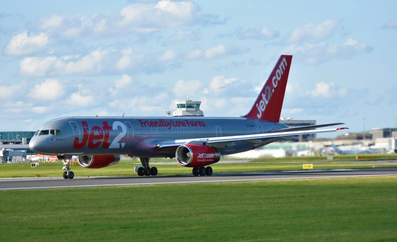 the airplane on the tarmac is preparing to take off