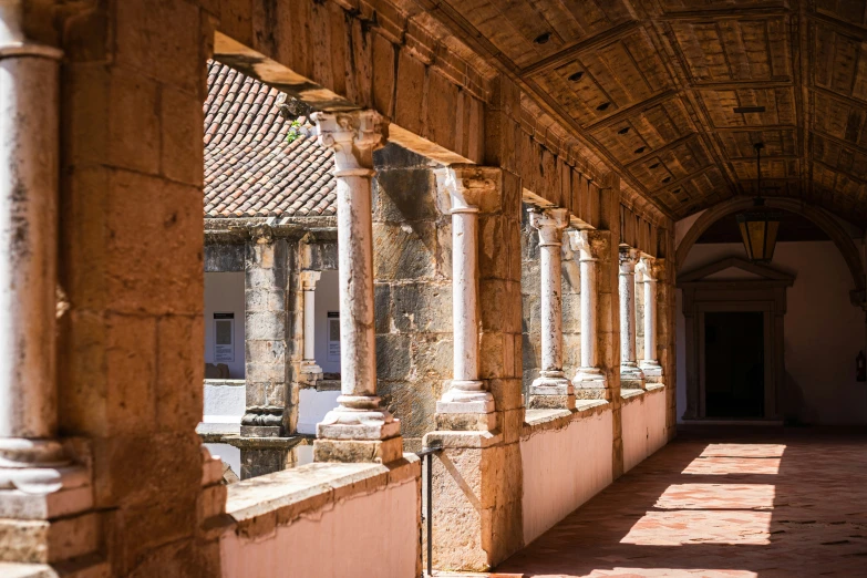 columns lined up along the sides of two buildings