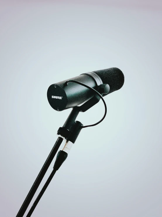 a close up of a microphone on a tripod