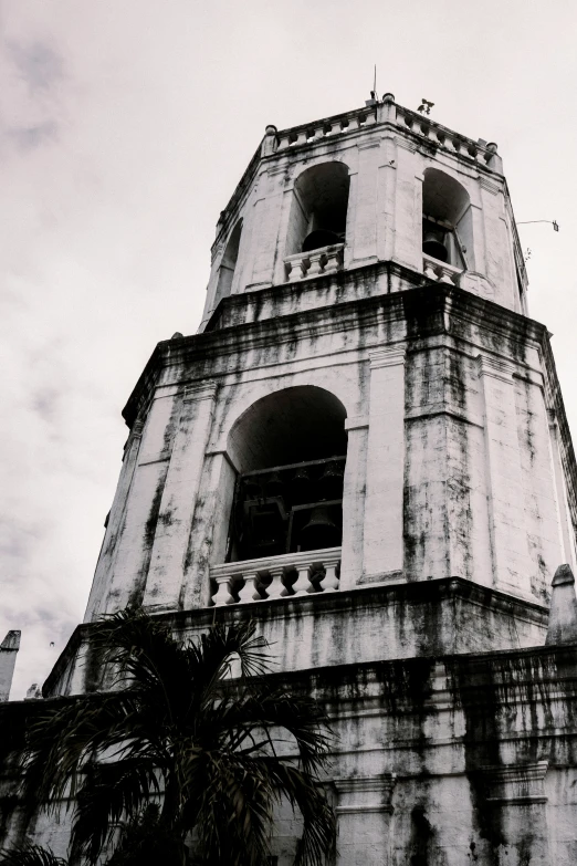 an old building with very tall windows on top